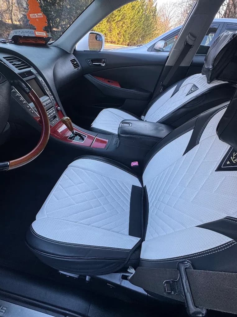 Freshly cleaned black and white front seats and center console
