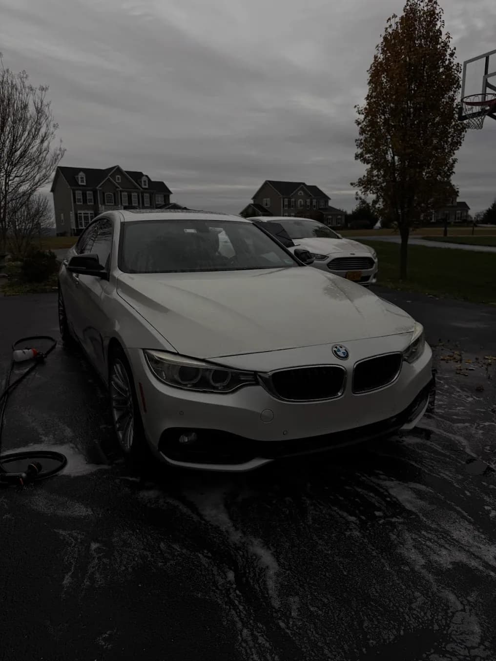 Clean light-colored luxury vehicle interior after detailing