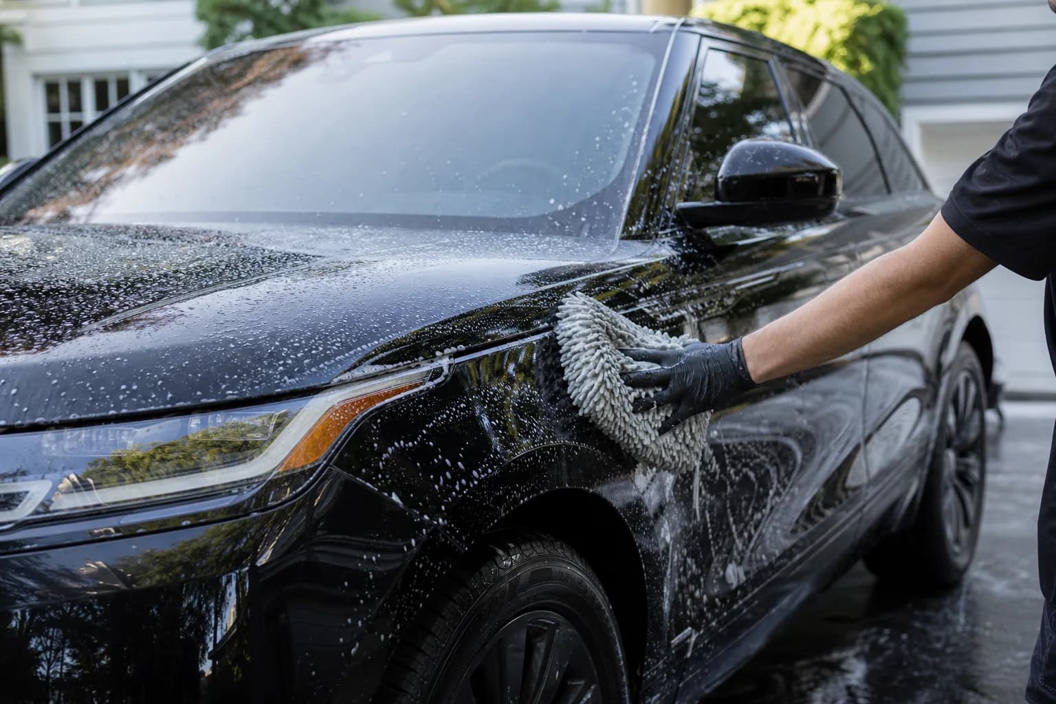 Freshly detailed luxury vehicle exterior with a clean glossy finish